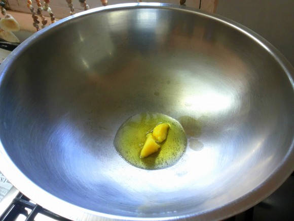  put ghee into fry pan 