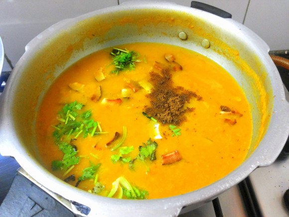 adding garam masala and coriander leaves