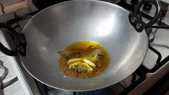 put cumin seed, clove, bay leaf, garlic flake 