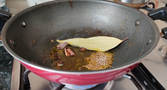 add cumin seed, bay leaf, cinnamon, black cardamom