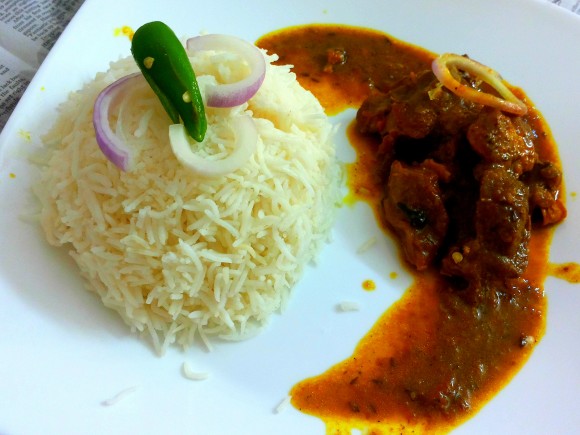 Mutton currywith whole garlic