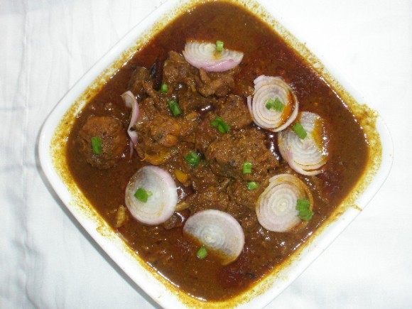 Mutton currywith whole garlic