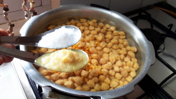 Boil soaked Kabuli chana and chana dal with salt, 1teaspoon of ginger paste 