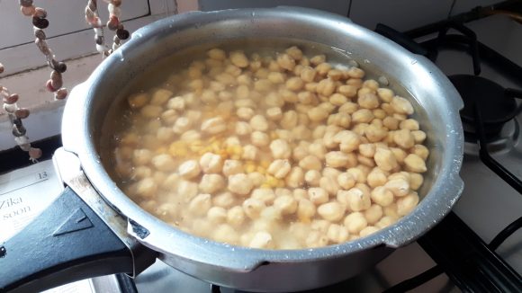 Boil soaked Kabuli chana and chana dal with salt, 1teaspoon of ginger paste 