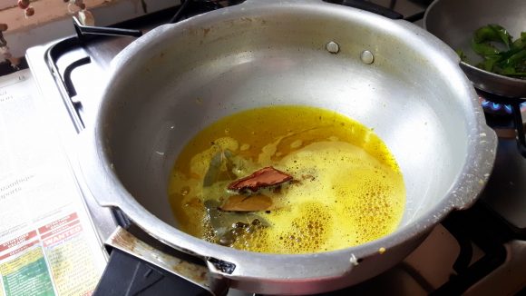 Take fry pan heat oil 