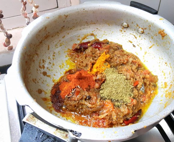 add chili powder, coriander powder, turmeric powder and salt 