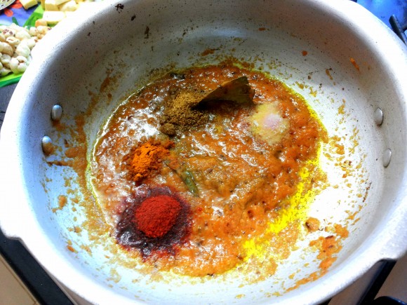 Add chilli powder, coriander powder, turmeric powder and salt