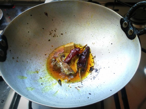 Heat oil in fry pan 