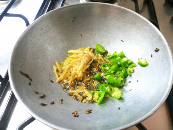 adding curry ginger and green chili