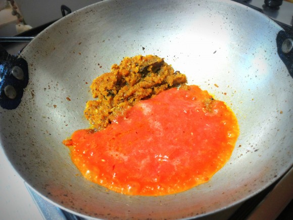 Adding tomato paste