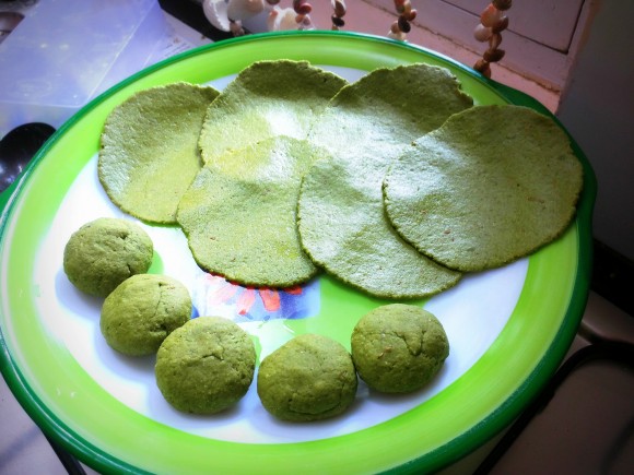 balls and raw Palak (spinach) poori