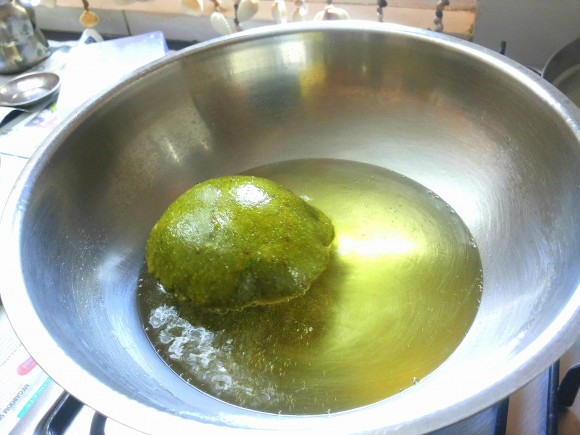 Deep frying the poori 