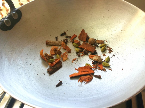 dry roast cinnamon, clove, green cardamom and mace 