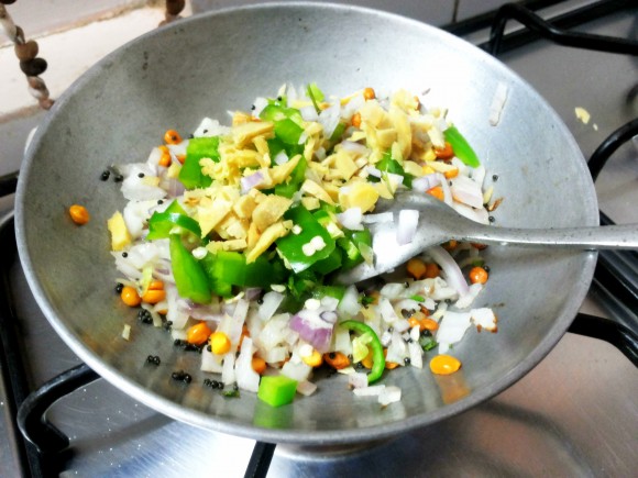 adding onion,ginger and chili