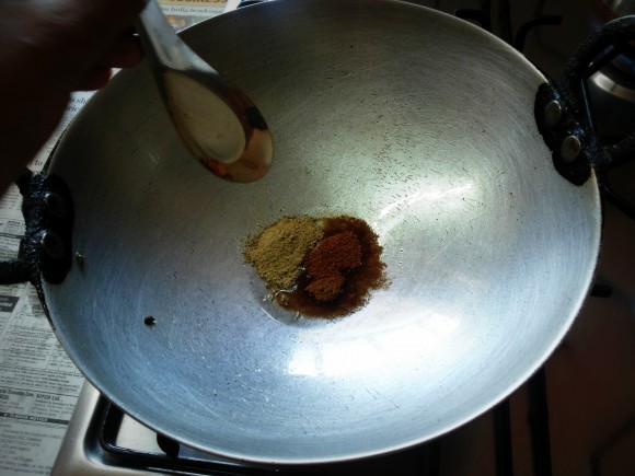 adding roasted cumin powder