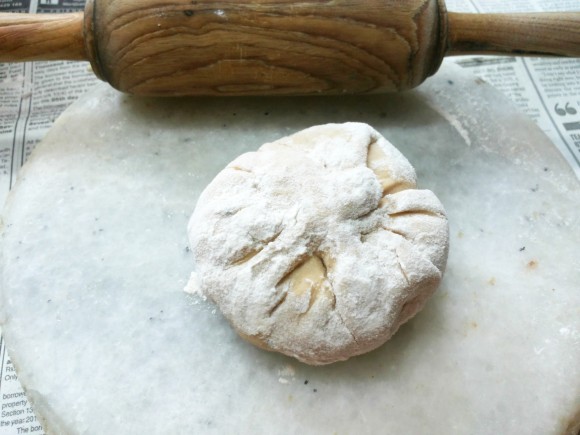 roll this ball into the wheat flour