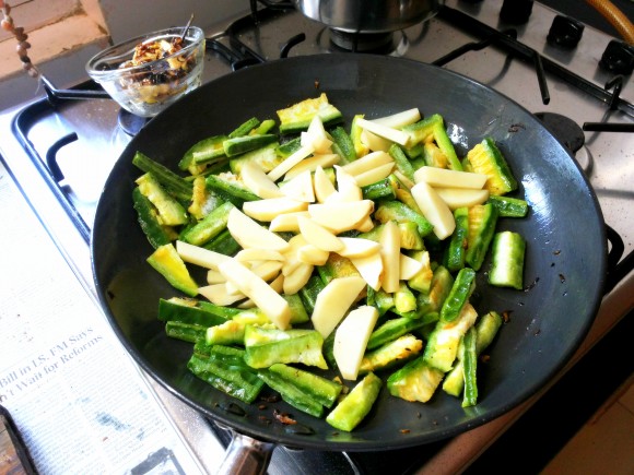 Add ridge gourd and potato