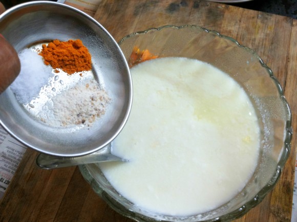 put curd, salt, asafoetida and turmeric powder