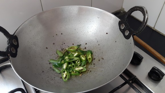 Add curry leaves, green chili