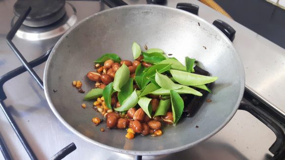 add curry leaves, green chili ,fry for a minute, put off the flame and add asafoetida powder.