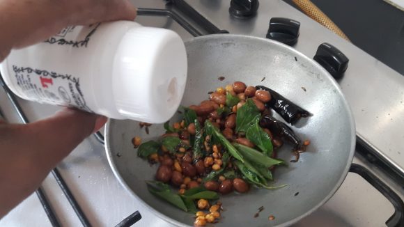 add curry leaves, green chili ,fry for a minute, put off the flame and add asafoetida powder.