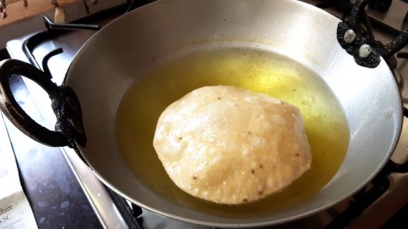 Deep fry the poori 