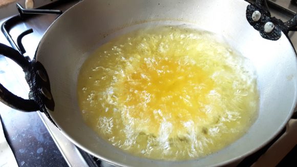 Deep fry the poori 