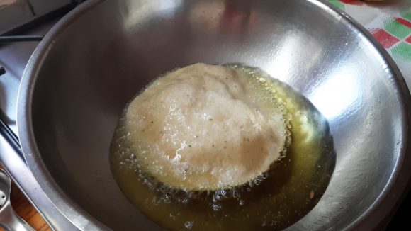 Deep fry the poori 