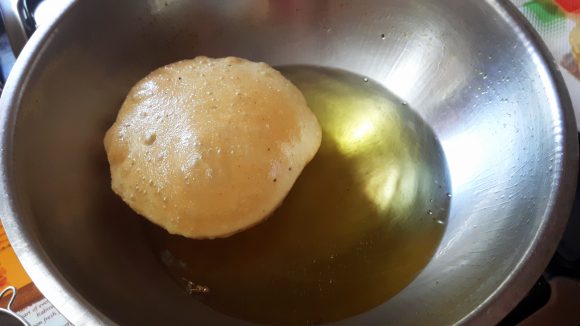 Deep fry the poori 