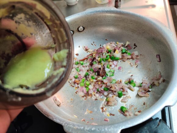 Add garlic shoot, green chili and garlic paste