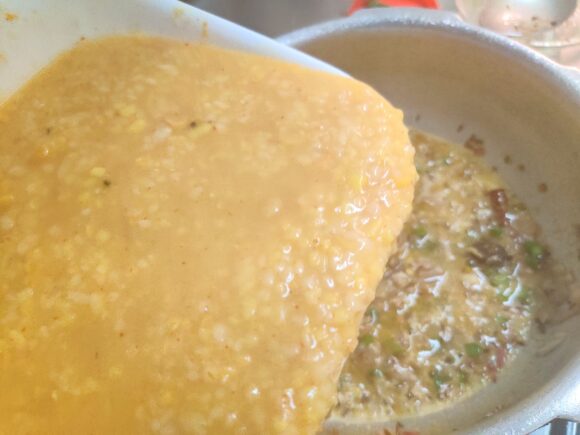 Add cooked dal and Dalia 