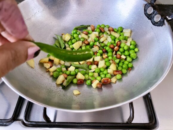 add peas, slitted chilli