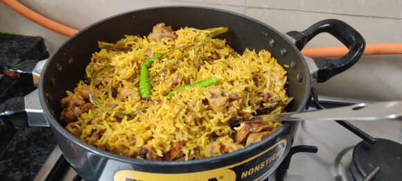 stir lightly the pulao with the help of fork