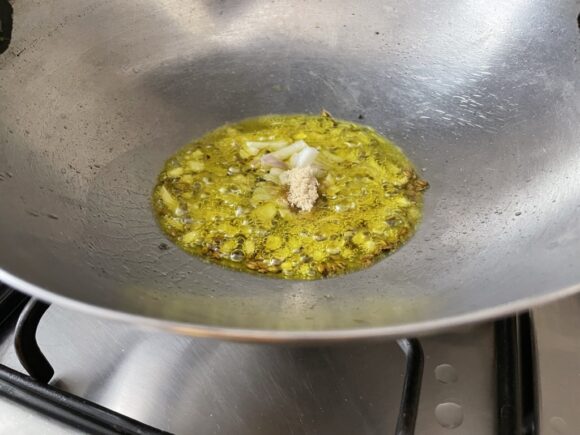 add chopped green chilli and finely chopped onion