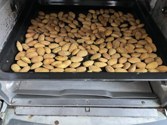 Place the prepared nuts in a single layer on baking tray