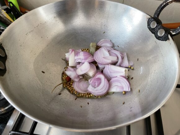 Add chopped onion, garlic and ginger