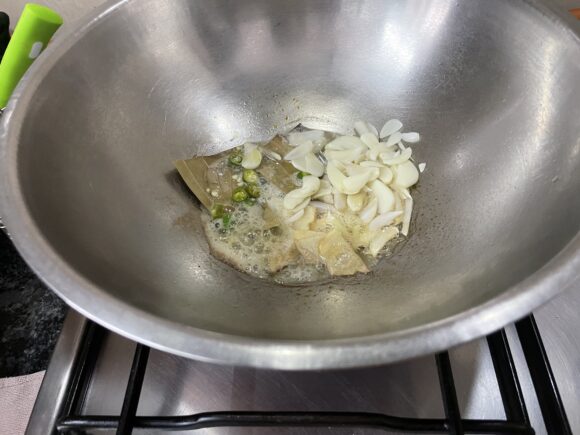 Add ginger, garlic and green chilli