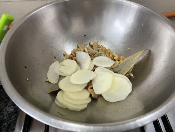 Add potato and onion