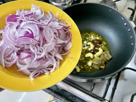 Add  other half chopped onion and Pandan Leaf