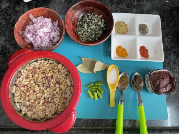 Slice Shevla horizontally, keep aside into bowl filled with water; chop onion and green chilli