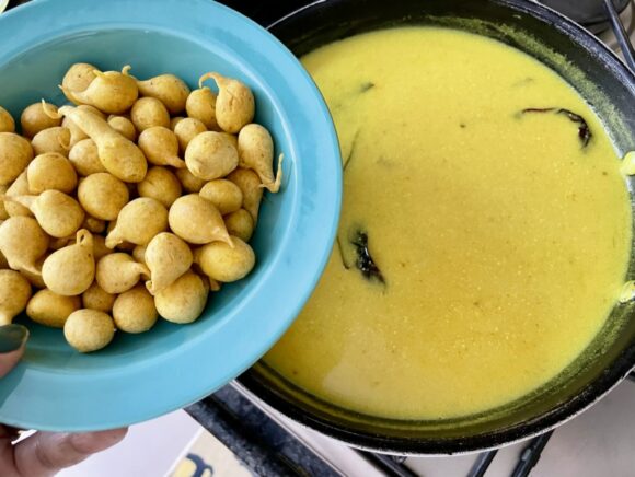 Put prepared balls into  boiled kadhi