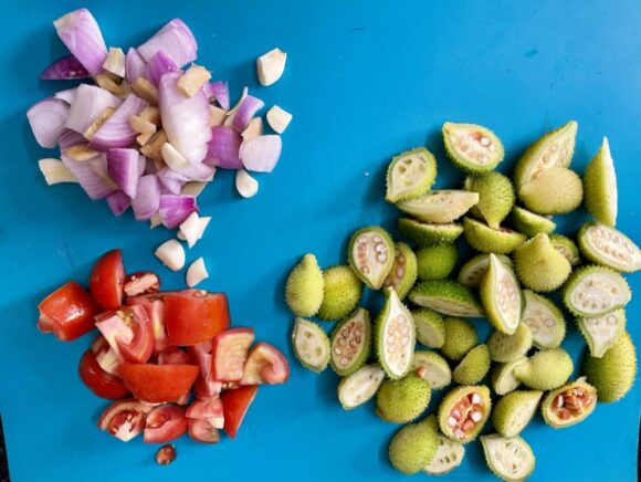 chop onion, tomato, garlic and ginger,