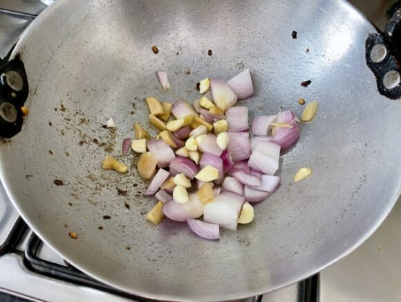 add chopped onion, garlic and ginger