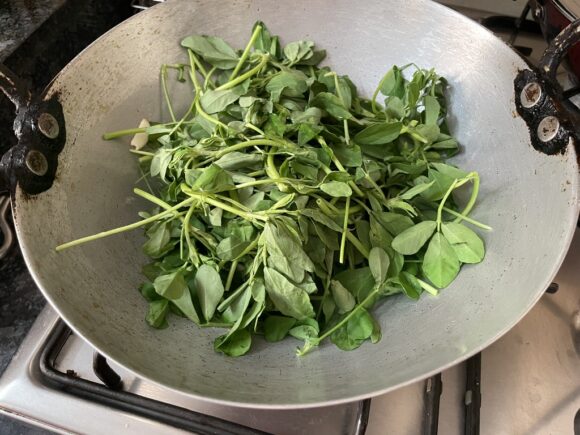 Add  roughly chopped fenugreek leaves