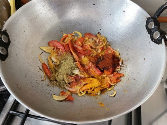 Add chilli powder, turmeric powder, salt and coriander powder