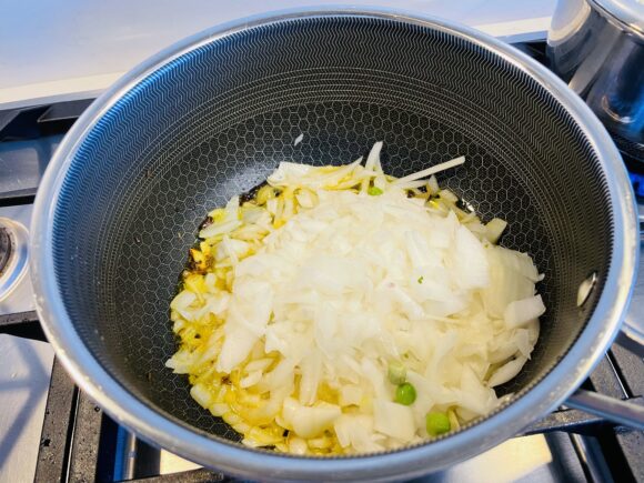 Add onion, stir fry on high flame