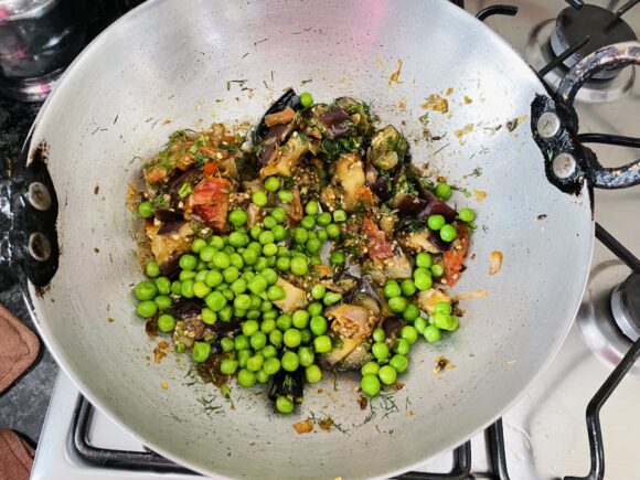 Add eggplant and peas