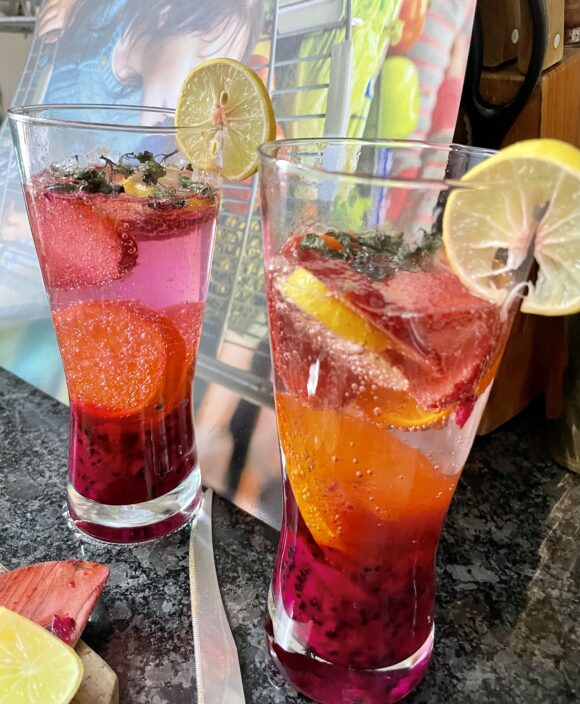 Garnish with lemon slices and mint leaves